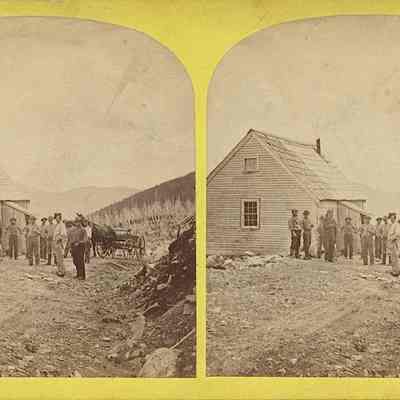 Men Standing by a Mountain Road