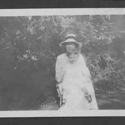 Woman and Child Posed Outside