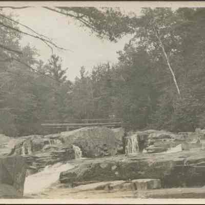 Rocky Pool with Footbridge in the Background