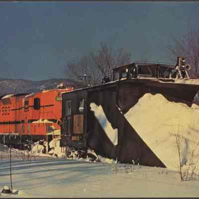 Train Plowing Snow