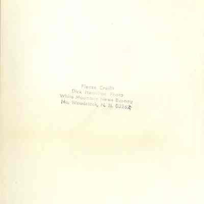 Back of photograph with Dick Hamilton's stamp.