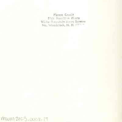 Back of photograph with Dick Hamilton's stamp.