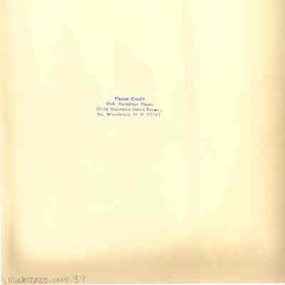 Back of photograph with Dick Hamilton's stamp.