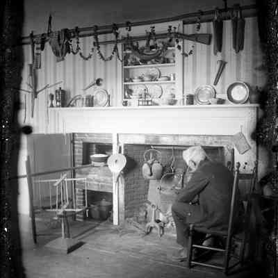 Man by Hearth
