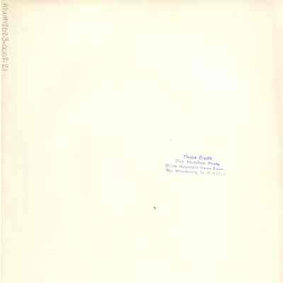 Back of photograph with Dick Hamilton's stamp.