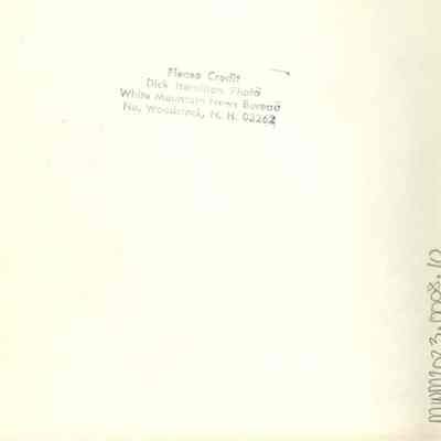 Back of photograph with Dick Hamilton's stamp.