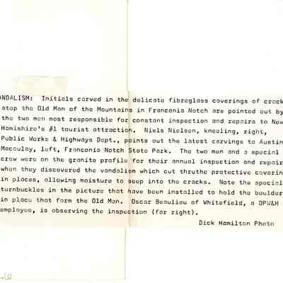 Back of photograph with note unfolded.