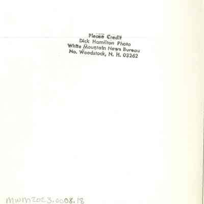 Back of photograph with Dick Hamilton's stamp.