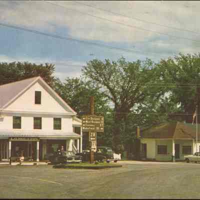 Store Front with Cars in the Parking Lot