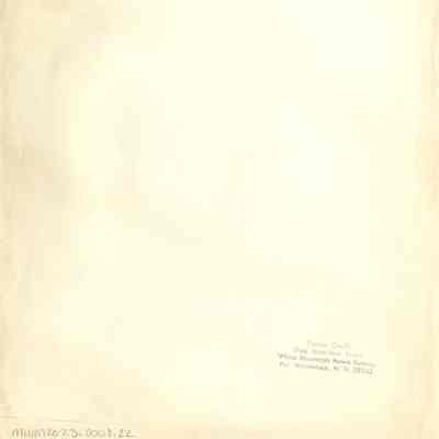 Back of photograph with Dick Hamilton's stamp.