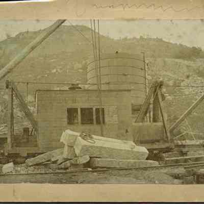 Building by Railroad Tracks