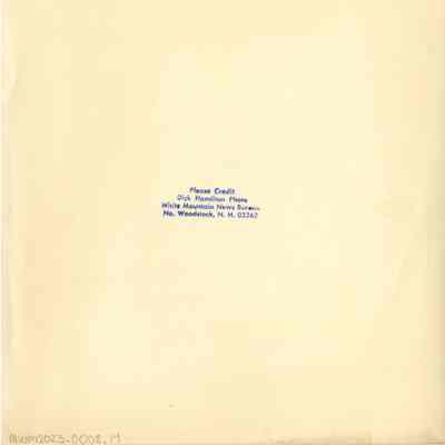 Back of photograph with Dick Hamilton's stamp.