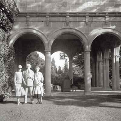 Coe_Caroline_014: Caroline Coe, W.R. Coe, and unknown woman outside Coe Hall at Planting Fields