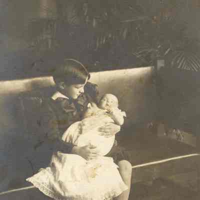 Coe_Family_010: Robert D. Coe holding Henry H.R. Coe as a baby