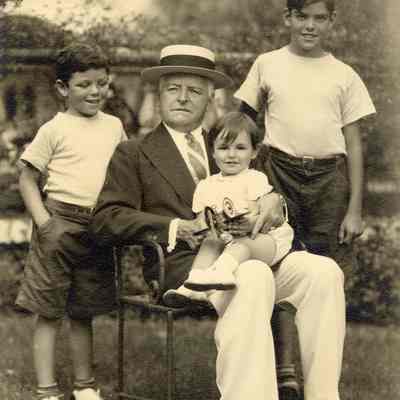 Coe_Family_029: Portrait of Michael D. Coe, W.R. Coe, Ernesto "Tino" Vitetti, and W.R. Coe II, photographed by Albert R. Dupont