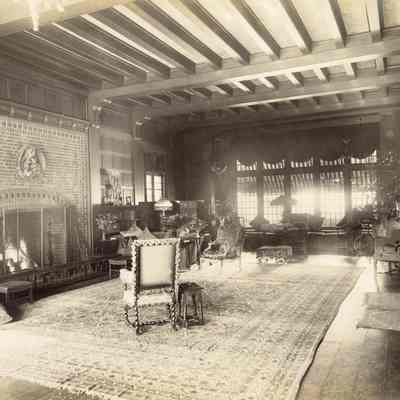 Byrne_007: Interior of Great Hall looking towards brick fireplace and large window