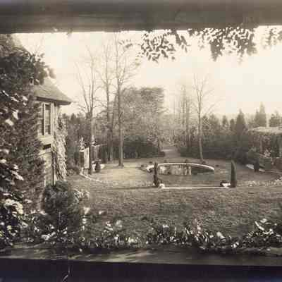 Byrne_010: Garden with circular pool and Byrne House in periphery, photographed by August Patzig