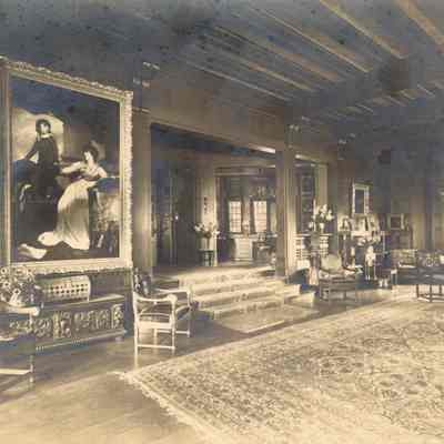 Byrne_039: Interior of Great Hall looking towards steps with runner rugs=