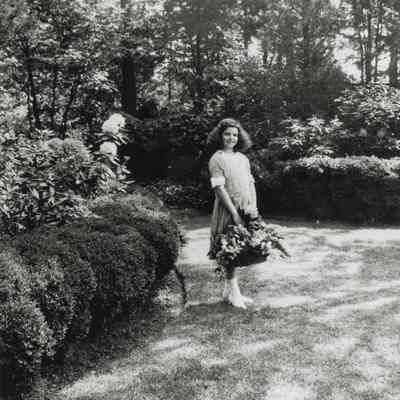 Coe_Natalie_020: Natalie Coe with basket of flowers
