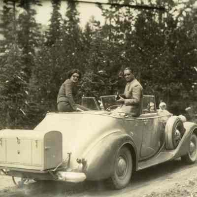 Coe_Natalie_042: Natalie Coe and Robert Coe sitting in car