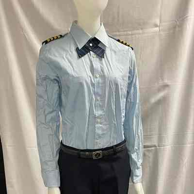 Light blue blouse, black long pants
