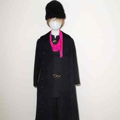 Black tunic dress long sleeves, black long pants, tall black boots, gold chain belt, pin, raspberry scarf, black long coat and cossick hat.
Coat, hat, pin and scarf are not included.