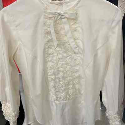 White ruffled blouse
Collection: Carole Scallon
Location: Museum of Flight