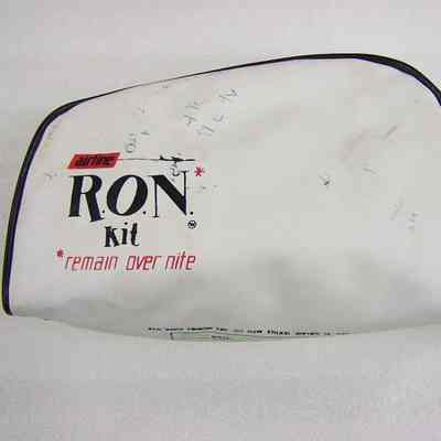 RON Kit (Remain over nite) bag: White with blue lettering and trim