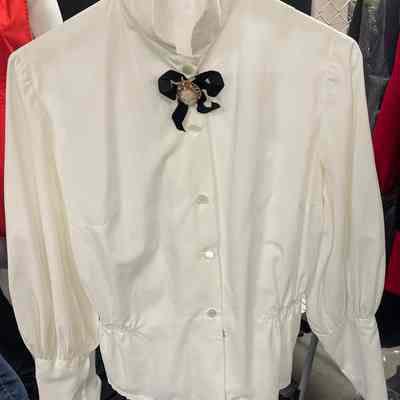 White high-neck blouse
Collection: Elizabeth Kitely
Location: Museum of Flight
