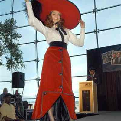 Long red skirt, short red skirt, 2 white blouses, black belt, large red hat.
1966
Location: Museum of Flight