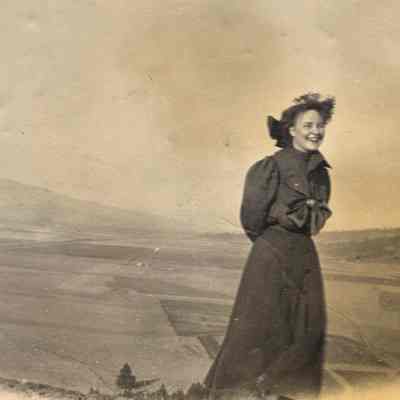 Photograph Smiling Woman on Hill