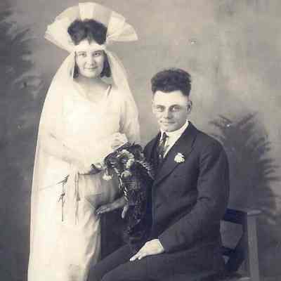 unidentified wedding couple in 1920's style dress..