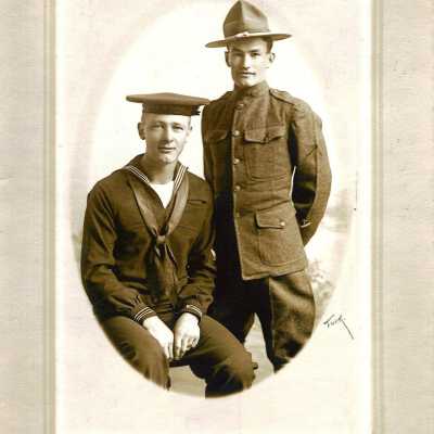 Roy Mashburn and Merl Stiffler circa 1918. Roy is seated wearing Navy uniform