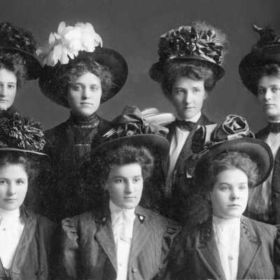 Women showing off stylish hats: Origformat: Print-Photographic; Resolution: 300