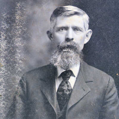 older man with beard, unidentified