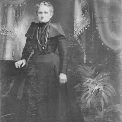 standing woman, unidentified