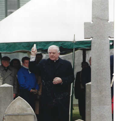 Auxiliary Bishop of Providence Robert Mulvee Sprinkles Holy Water at Cemetery Dedication 1999