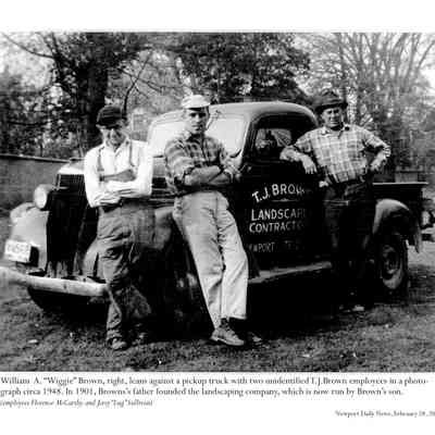 T.J. Brown Truck with three employees