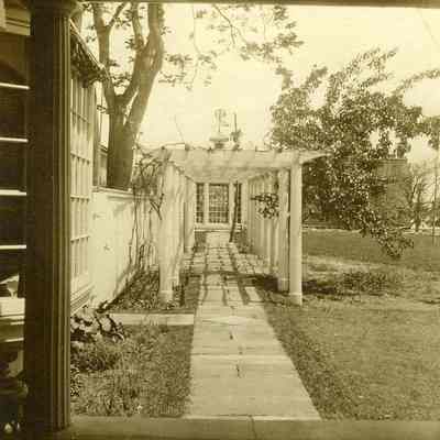 Looking at covered walkway without vegetation at "The Hill"