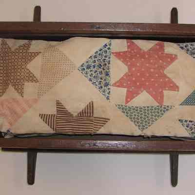 Cradle, Doll