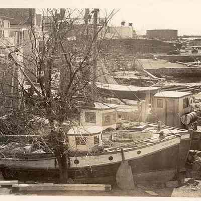 Fishing boats behind Davis' funeral parlor, Water Street, Stonington CT