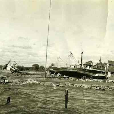 Boats washed on shore