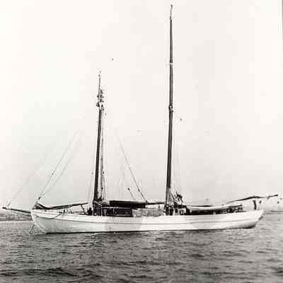 Sailing sloop at anchor in harbor, Stonington CT