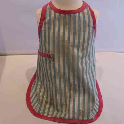 Green and white striped child's bib apron