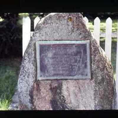 Stone marker at corner of Elm and Main Streets