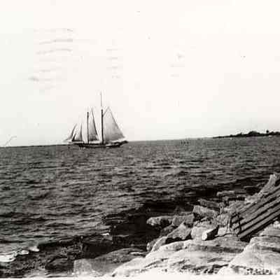 Sailing vessel leaving harbor, Stonington CT