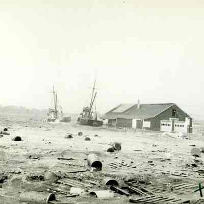 Town Dock with fishing boats and debris