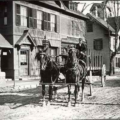 Team of horses and cart outside of Braytons Pharmacy. Corner of High Street and Main Street, Stonington CT