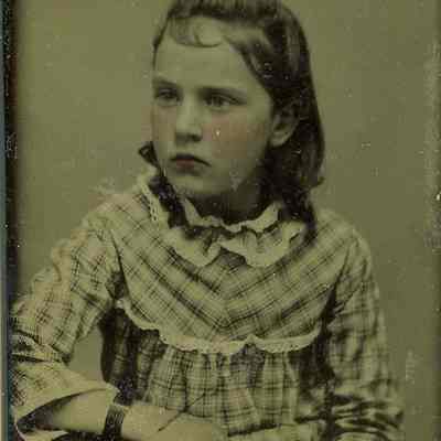 Unidentified young girl in plaid
