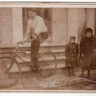 Alexander Palmer Loper on bicycle